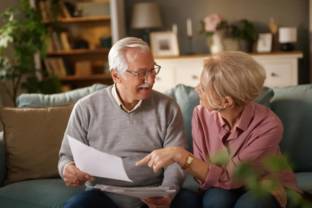 Senior couple discussing cost of assisted living